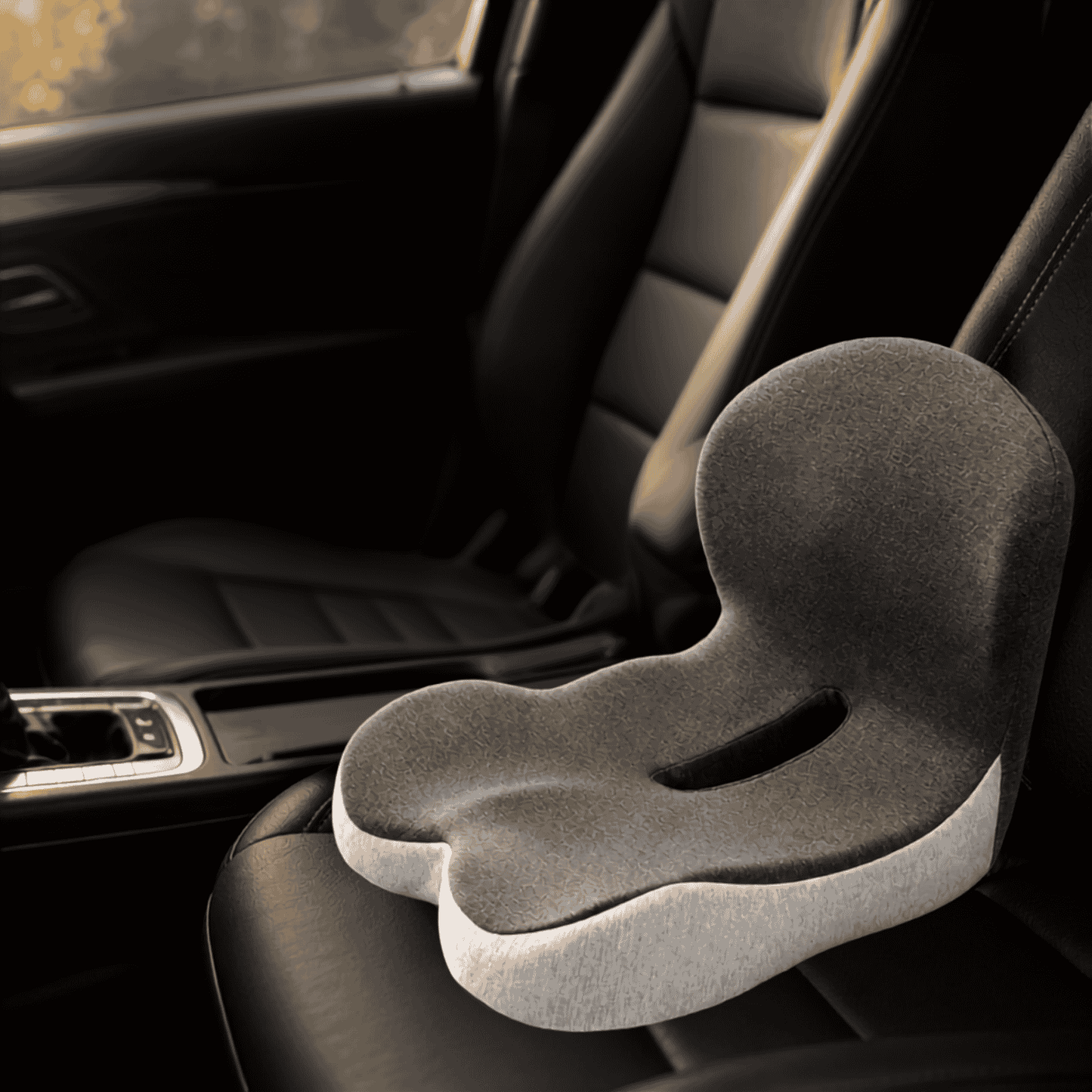 Cojín ergonómico Aeris en asiento de auto